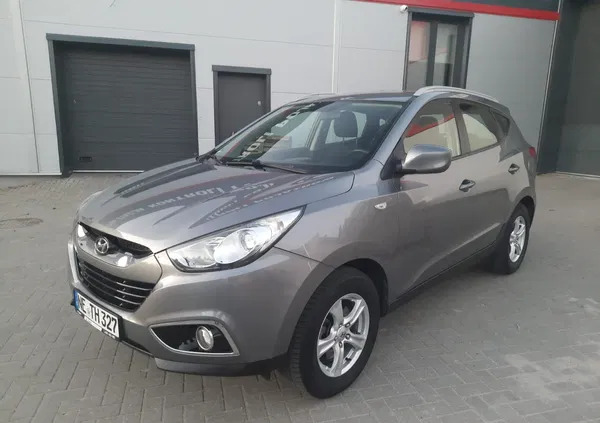 samochody osobowe Hyundai Tucson cena 38500 przebieg: 155475, rok produkcji 2012 z Mrągowo